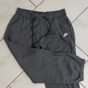 Nike women’s  Gray drawstring Sweatpants with White Logo and elastic cuffs